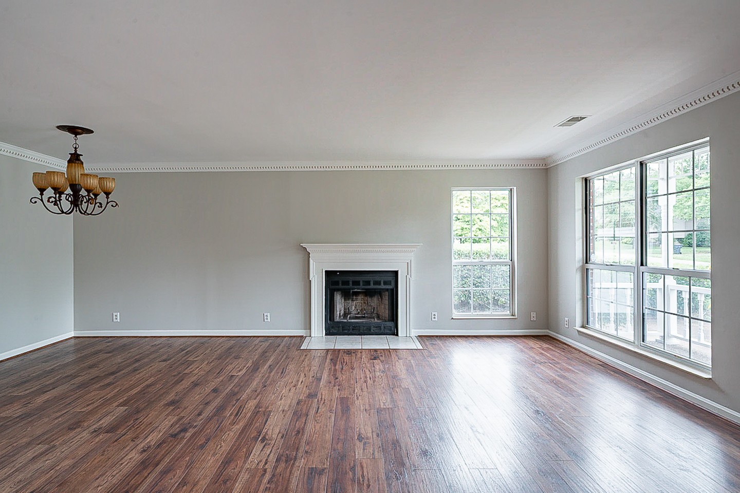 3433 Country Way Road Antioch, TN 37013 - Photo 5 of 29 wooden floor fireplace and windows in an empty room