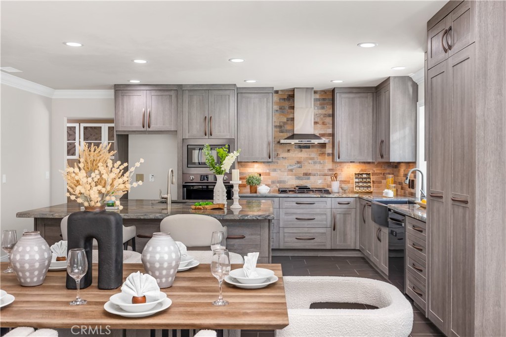 1391 Deborah Drive North Tustin, CA 92705 - Photo 12 of 56 a kitchen with white cabinets and appliances