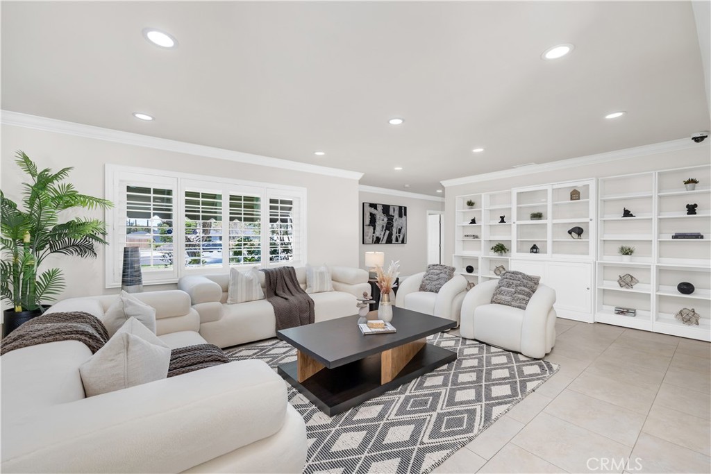 1391 Deborah Drive North Tustin, CA 92705 - Photo 16 of 56 a living room with furniture and a large window