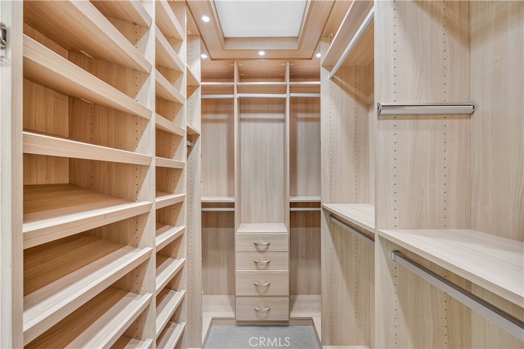 1391 Deborah Drive North Tustin, CA 92705 - Photo 21 of 56 a view of walk in closet with empty racks