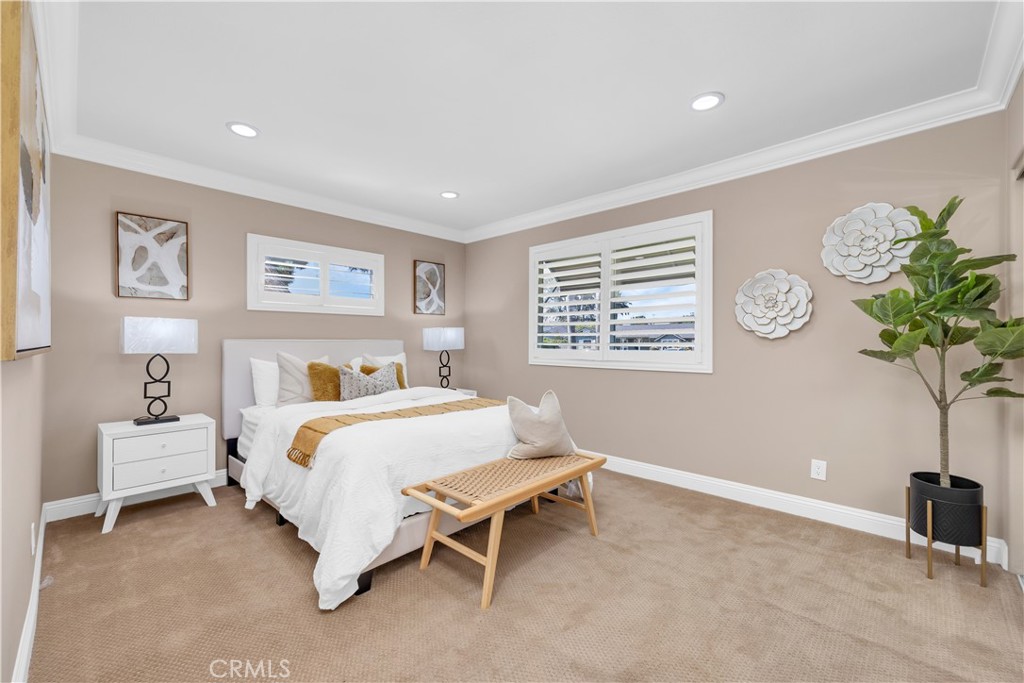 1391 Deborah Drive North Tustin, CA 92705 - Photo 22 of 56 a bedroom with a bed and a window