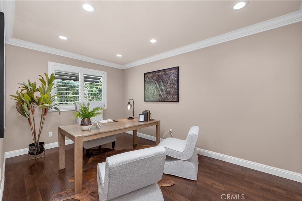 1391 Deborah Drive North Tustin, CA 92705 - Photo 29 of 56 a view of a workspace with furniture and a potted plant