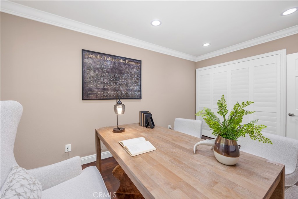 1391 Deborah Drive North Tustin, CA 92705 - Photo 30 of 56 a dining room with table and a potted plant