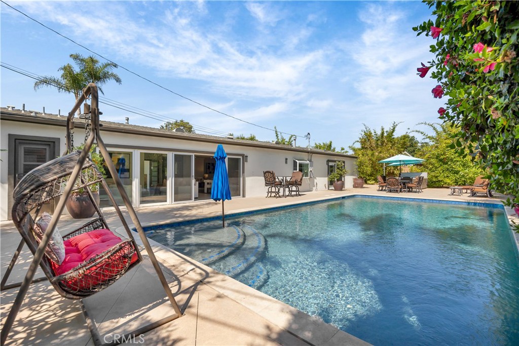 1391 Deborah Drive North Tustin, CA 92705 - Photo 34 of 56 a view of a house with swimming pool and sitting area