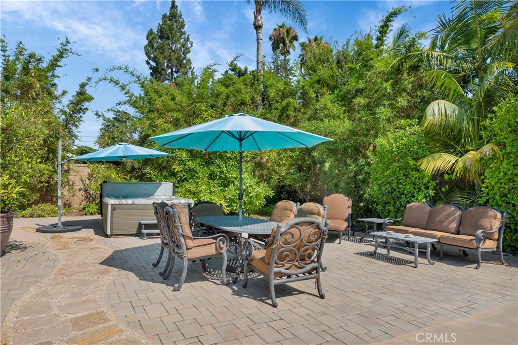 1391 Deborah Drive North Tustin, CA 92705 - Photo 35 of 56 a view of backyard with outdoor seating and trees