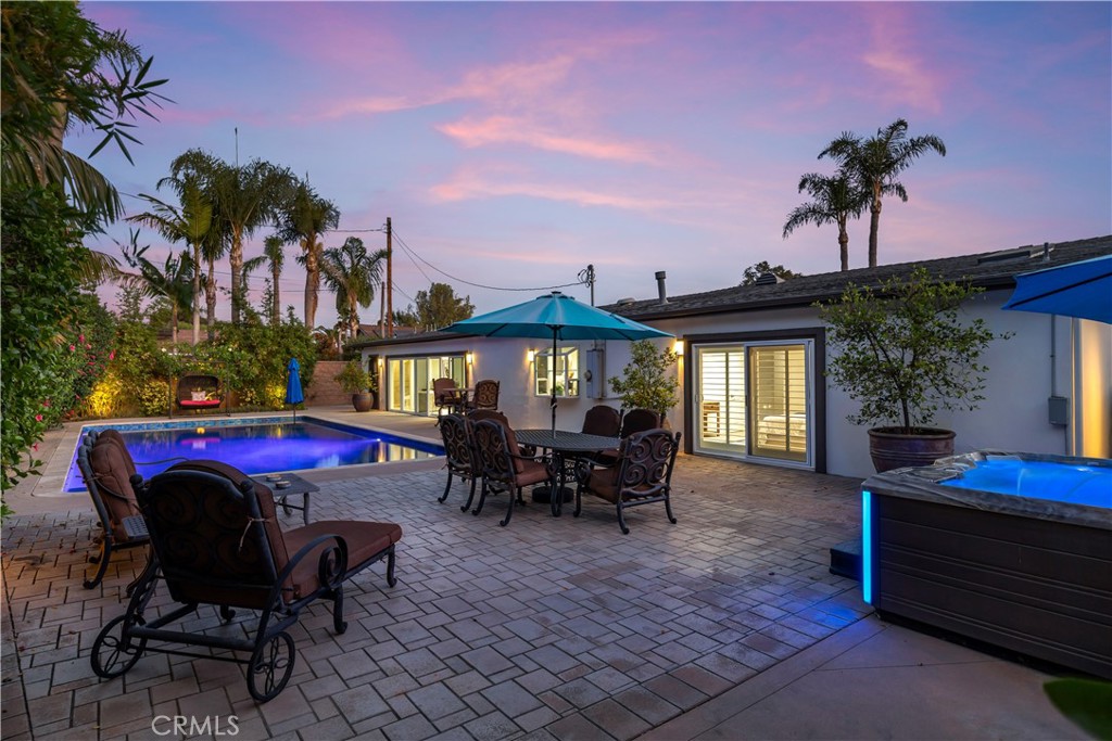 1391 Deborah Drive North Tustin, CA 92705 - Photo 48 of 56 a view of a house with a table and chairs in patio