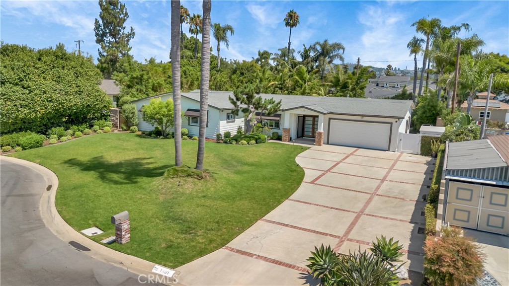 1391 Deborah Drive North Tustin, CA 92705 - Photo 5 of 56 a view of a house with a backyard