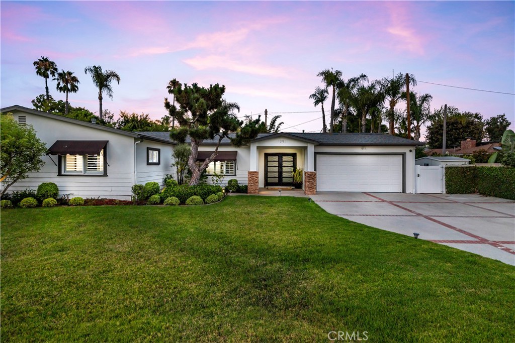 1391 Deborah Drive North Tustin, CA 92705 - Photo 51 of 56 a front view of a house with a garden