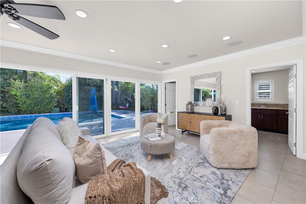 1391 Deborah Drive North Tustin, CA 92705 - Photo 9 of 56 a living room with furniture and a large window