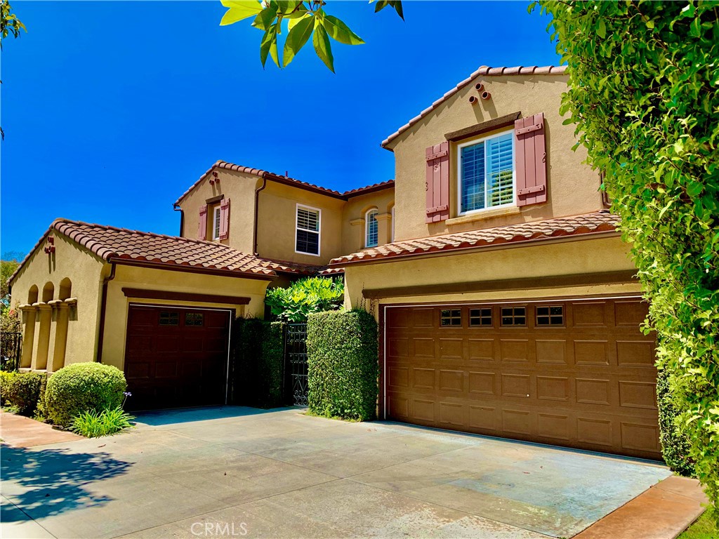 24 Calle Pacifica San Clemente, CA 92673 - Photo 2 of 41 a front view of a house with a garage