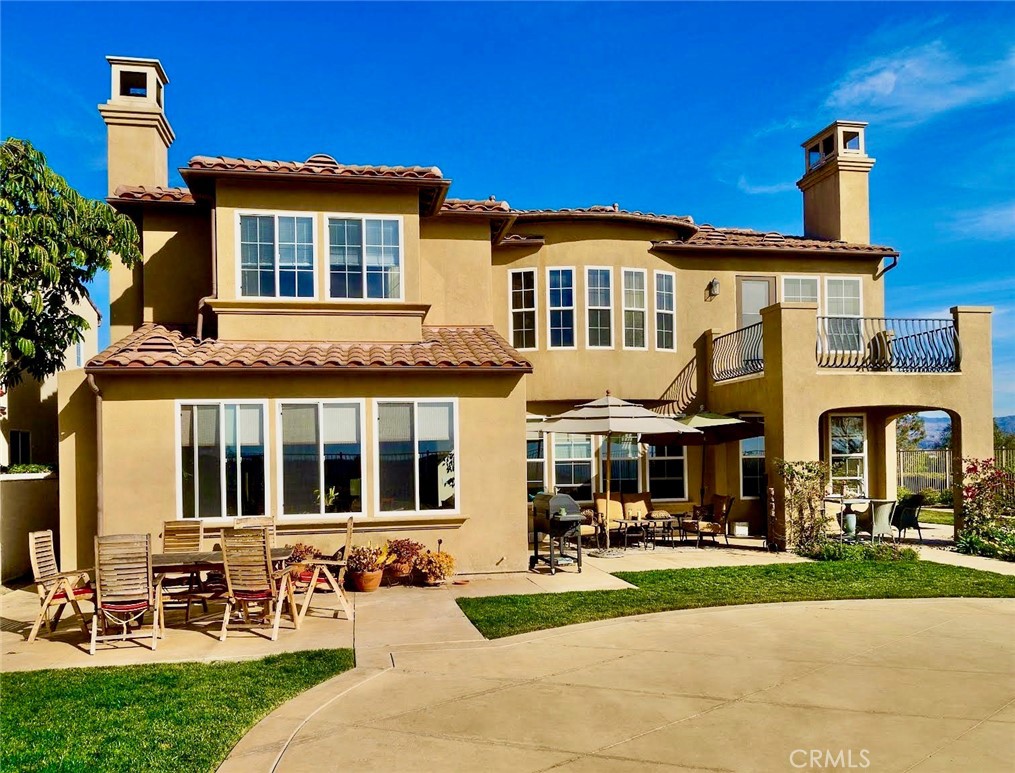 24 Calle Pacifica San Clemente, CA 92673 - Photo 24 of 41 a front view of a house with a yard