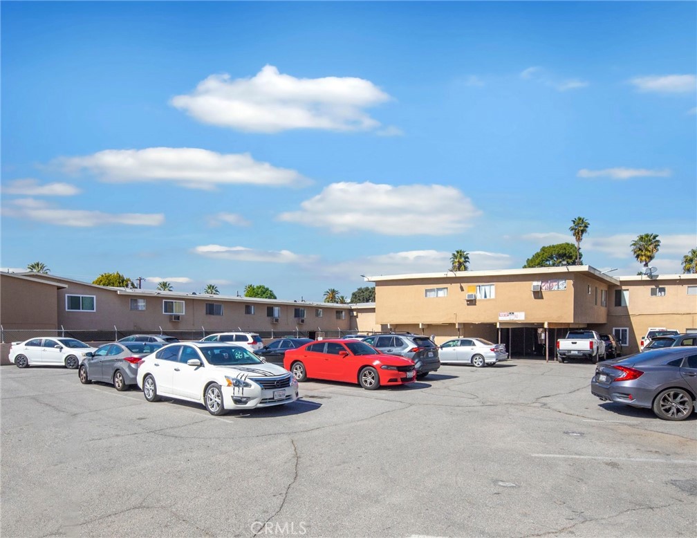 2032 West Linden Street Riverside, CA 92507 - Photo 13 of 66 a view of parking space with parked cars