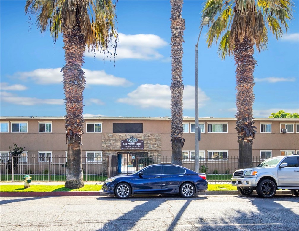 2032 West Linden Street Riverside, CA 92507 - Photo 36 of 66 a front view of a house with swimming pool and porch