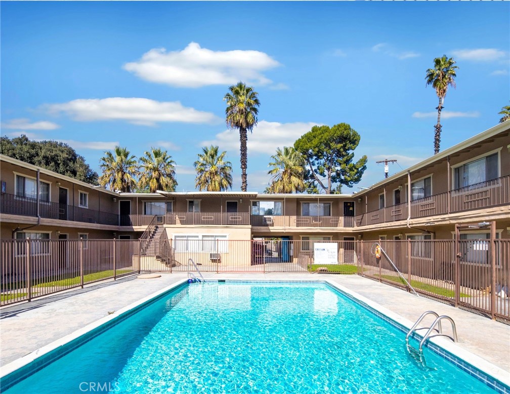 2032 West Linden Street Riverside, CA 92507 - Photo 40 of 66 a view of a swimming pool with an outdoor seating and yard