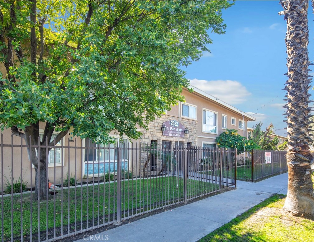 2032 West Linden Street Riverside, CA 92507 - Photo 9 of 66 a view of a house with a small yard and plants