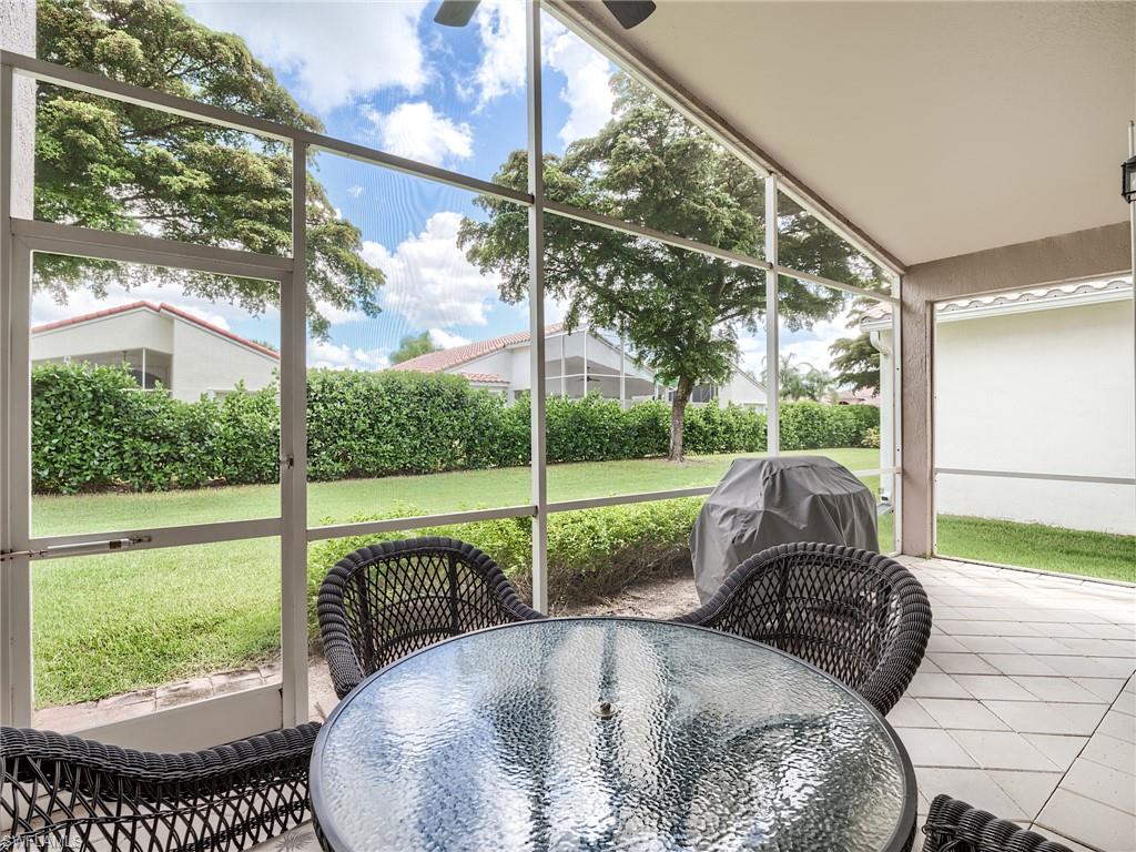 9460 Sun River Way Estero, FL 33928 - Photo 2 of 41 a view of swimming pool from a porch
