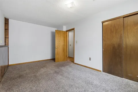 a bathroom with a shower and toilet