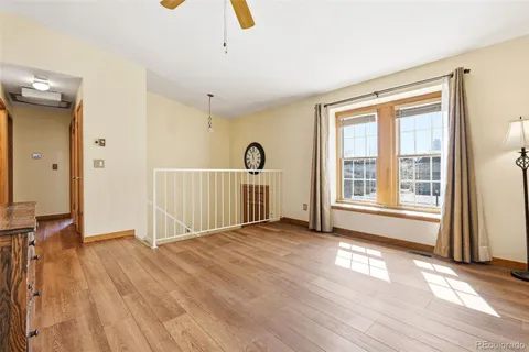 a view of entryway with wooden floor