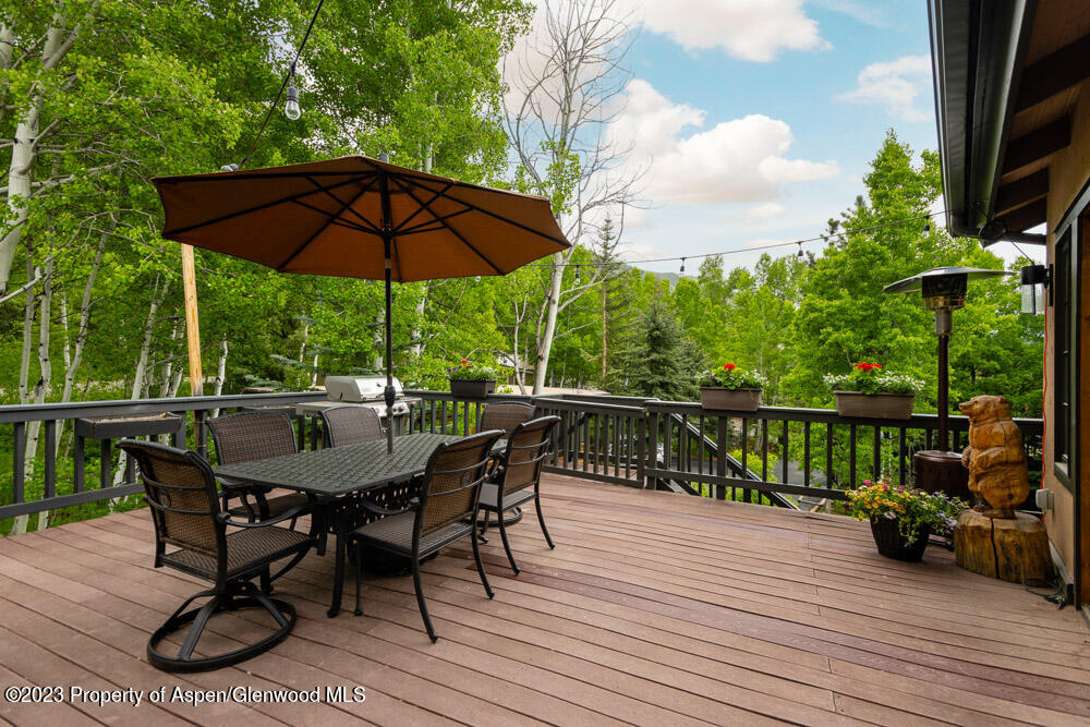 64 Eastwood Road Aspen, CO 81611 - Photo 3 of 24 a view of balcony with furniture and outdoor seating