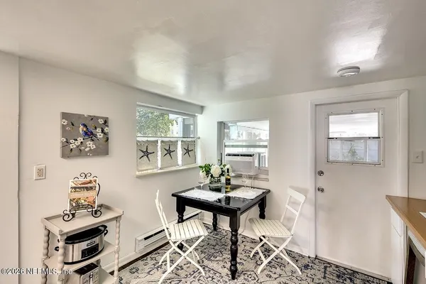 a living room with a couch and a table