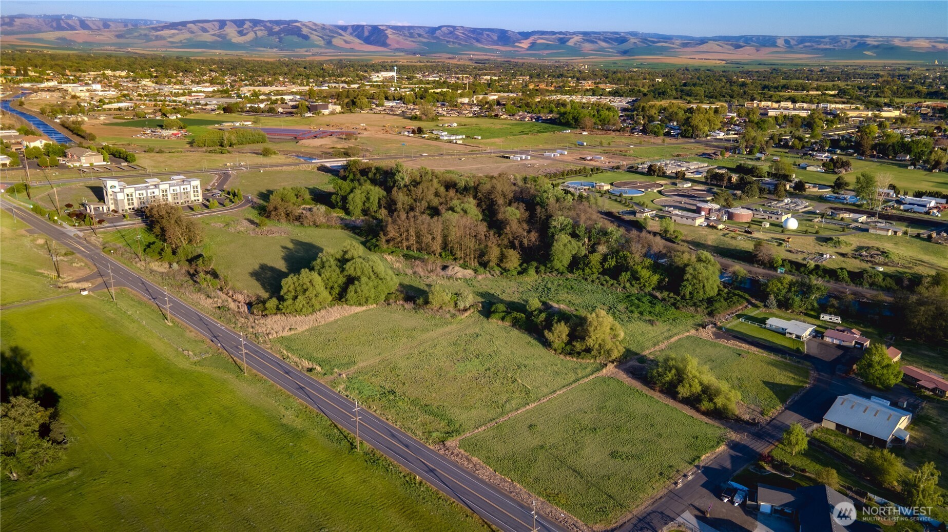 1595 Heritage Road Walla Walla, WA 99362 - Photo 3 of 5 an aerial view of residential houses with outdoor space