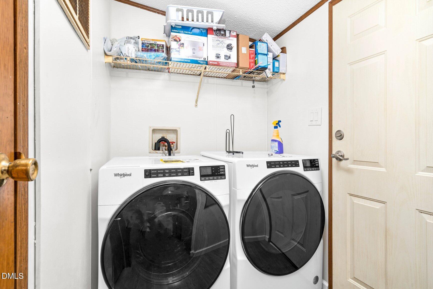 1835 Cokey Road Rocky Mount, NC 27801 - Photo 23 of 42 a utility room with dryer and washer