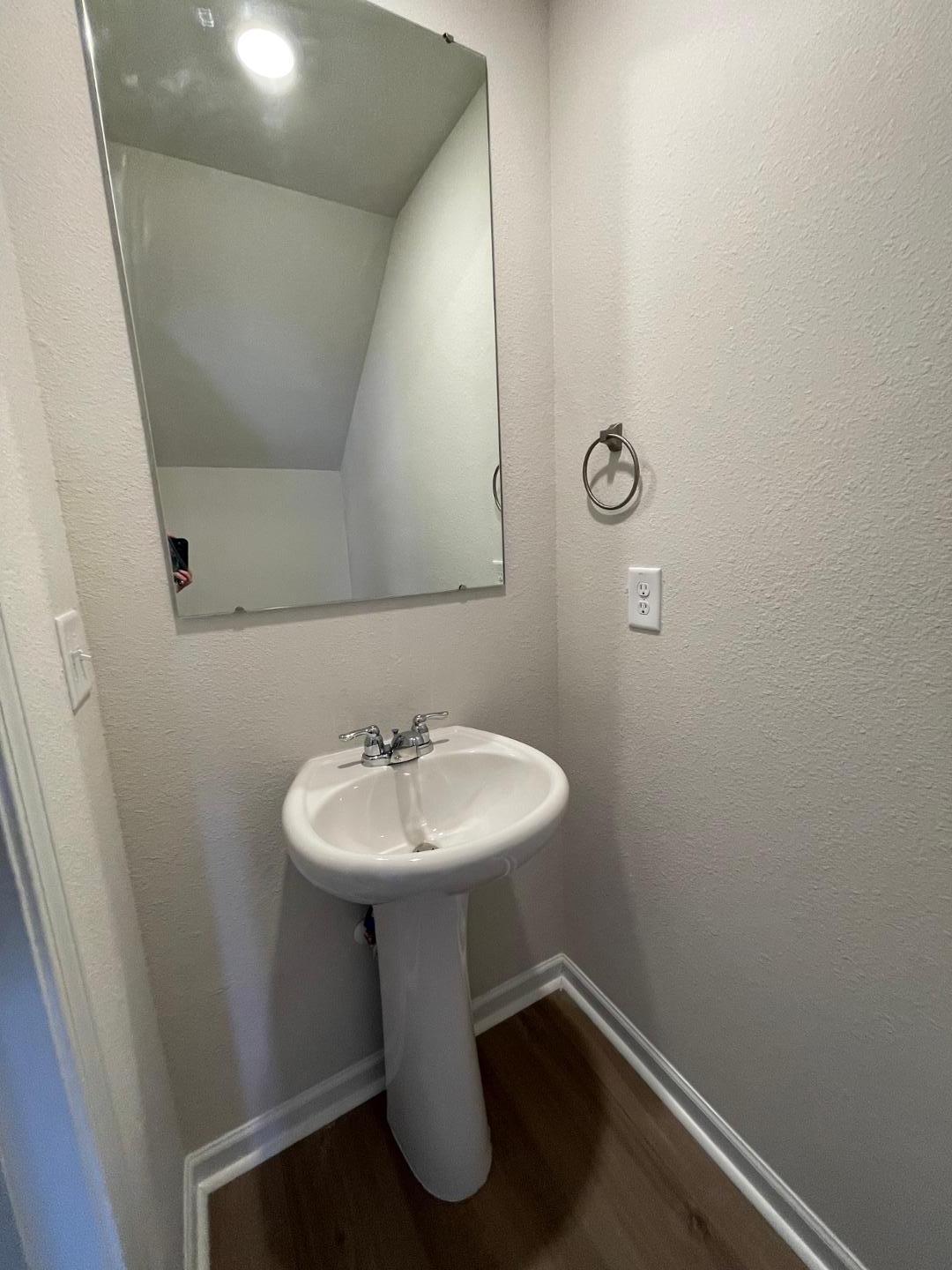 111 Hybrid Street Oxford, NC 27565 - Photo 11 of 25 a bathroom with a sink toilet and mirror