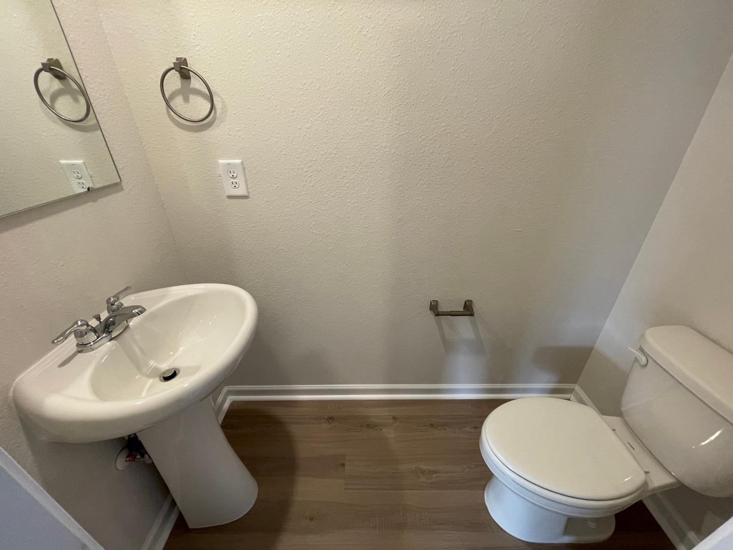 111 Hybrid Street Oxford, NC 27565 - Photo 10 of 25 a bathroom with a toilet sink and mirror