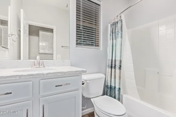 a view of wooden floor and a sink in a room