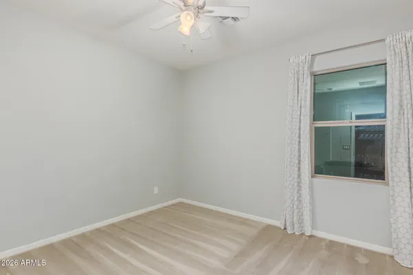 an empty room with a bathroom