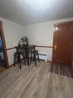 a workspace with furniture and wooden floor