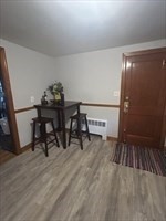 36 St Marks Road, Unit 2 Boston, MA 02124 - Photo 8 of 14 a workspace with furniture and wooden floor