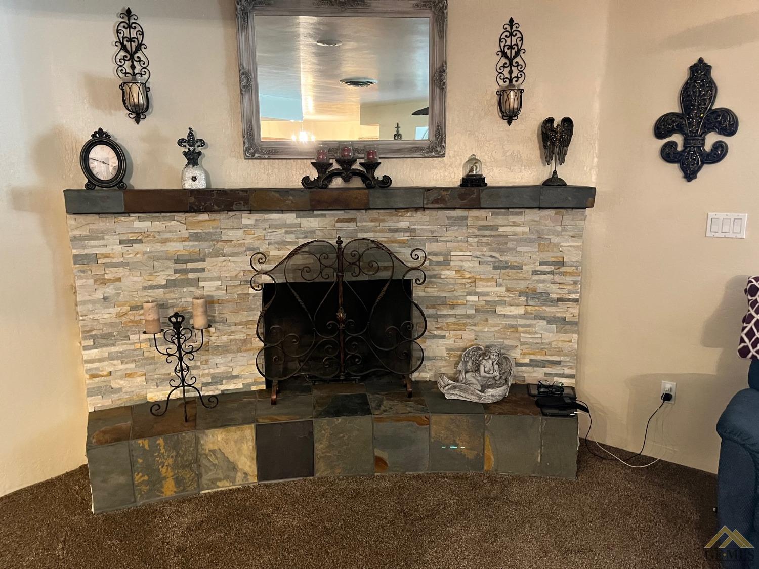 Undisclosed Address Bakersfield, CA 93309 - Photo 13 of 28 a bathroom with a sink and a mirror