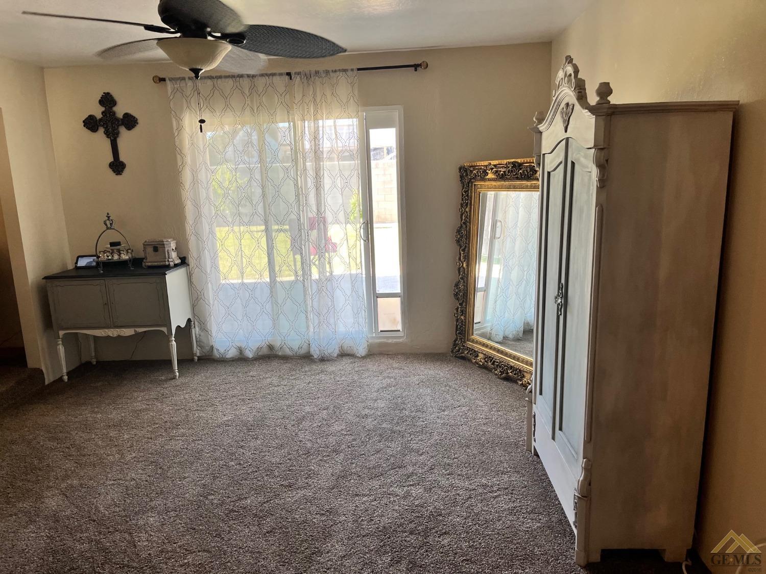 Undisclosed Address Bakersfield, CA 93309 - Photo 14 of 28 an empty room with windows