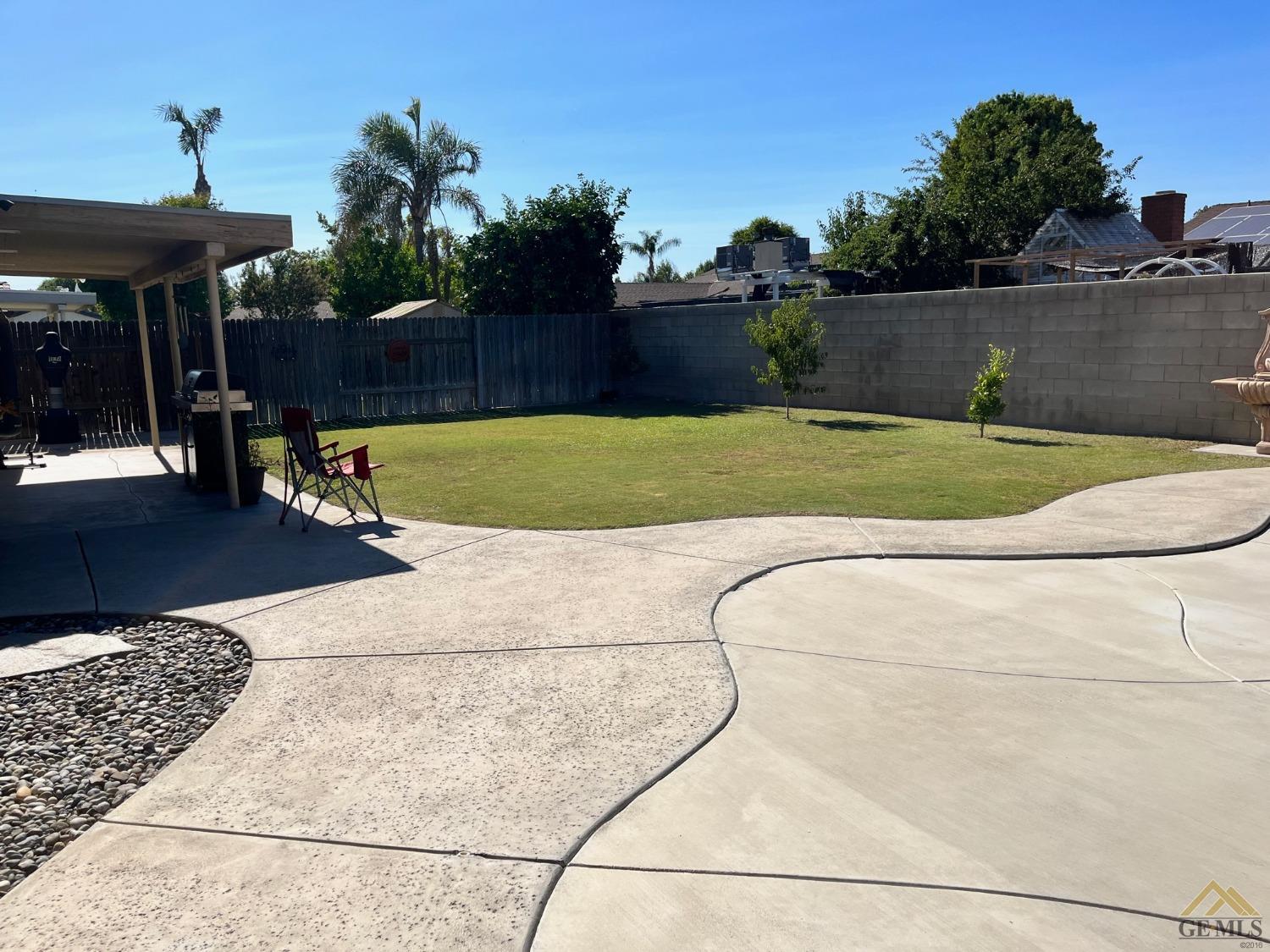 Undisclosed Address Bakersfield, CA 93309 - Photo 28 of 28 a view of a swimming pool with a patio