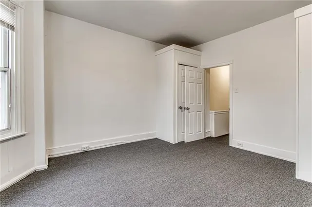 an empty room with a door