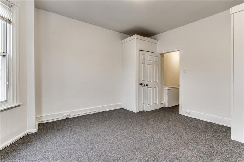 354 Ophelia Street Pittsburgh, PA 15213 - Photo 13 of 28 an empty room with a door