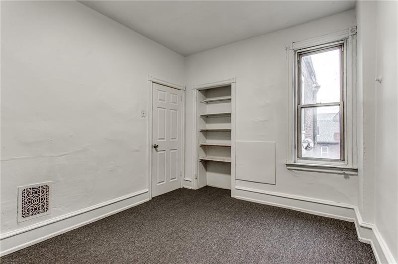 354 Ophelia Street Pittsburgh, PA 15213 - Photo 14 of 28 a view of an empty room with a window
