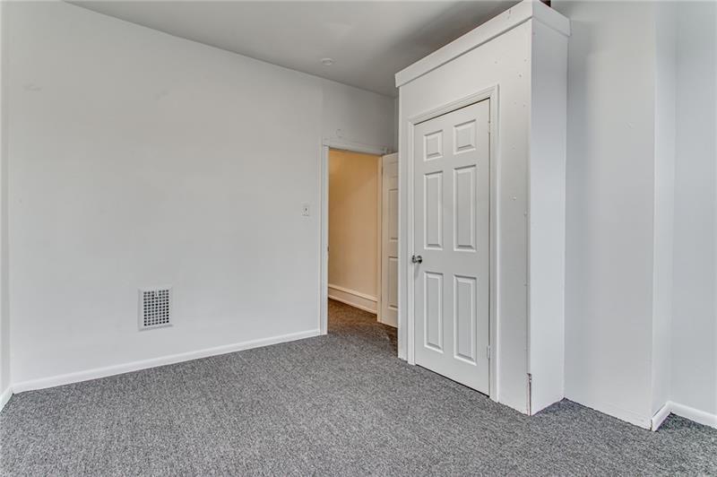 354 Ophelia Street Pittsburgh, PA 15213 - Photo 17 of 28 an empty room with windows