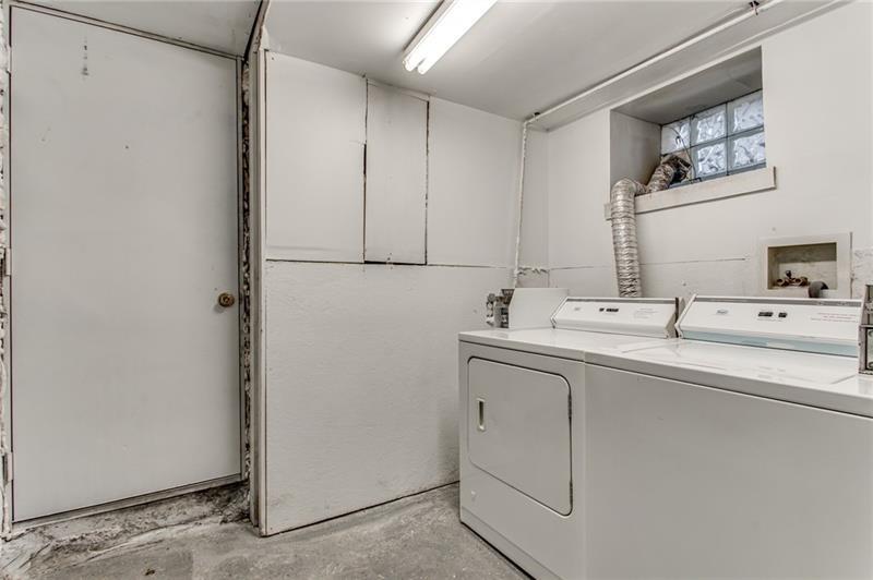 354 Ophelia Street Pittsburgh, PA 15213 - Photo 26 of 28 a bathroom with a sink and a mirror