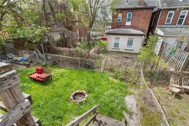a backyard of a house with lots of green space