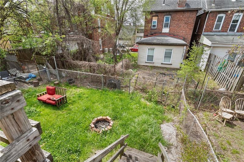 354 Ophelia Street Pittsburgh, PA 15213 - Photo 27 of 28 a view of a chair and table in backyard of the house