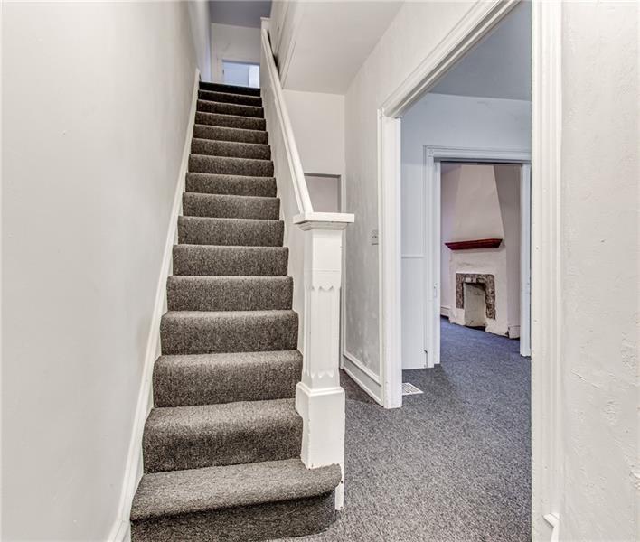 354 Ophelia Street Pittsburgh, PA 15213 - Photo 4 of 28 a view of entryway and hall with wooden floor