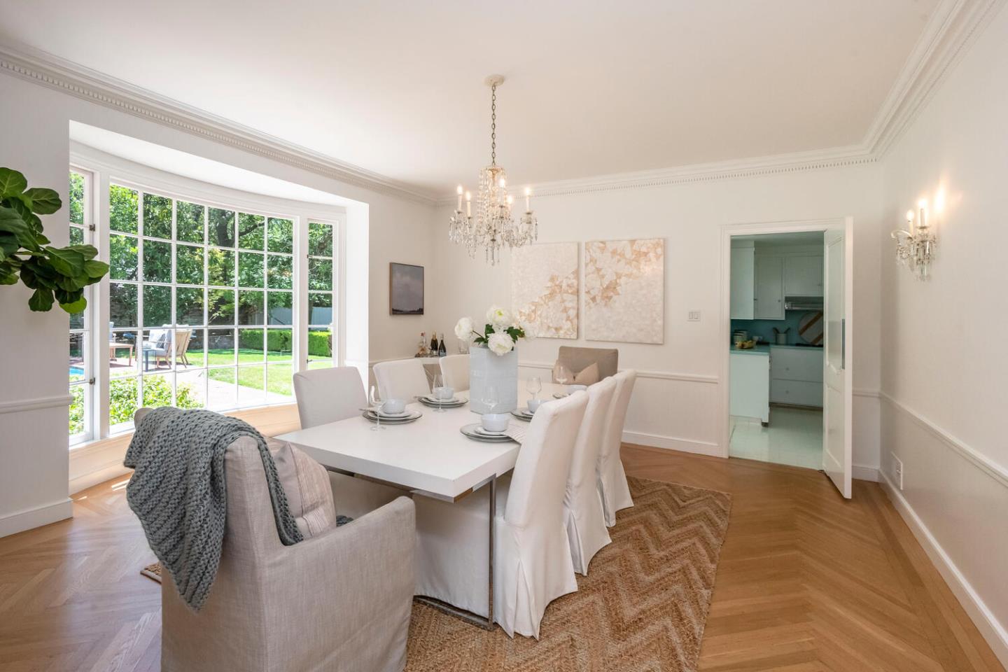7 Windsor Drive Hillsborough, CA 94010 - Photo 14 of 57 a view of a dining room with furniture large windows and wooden floor