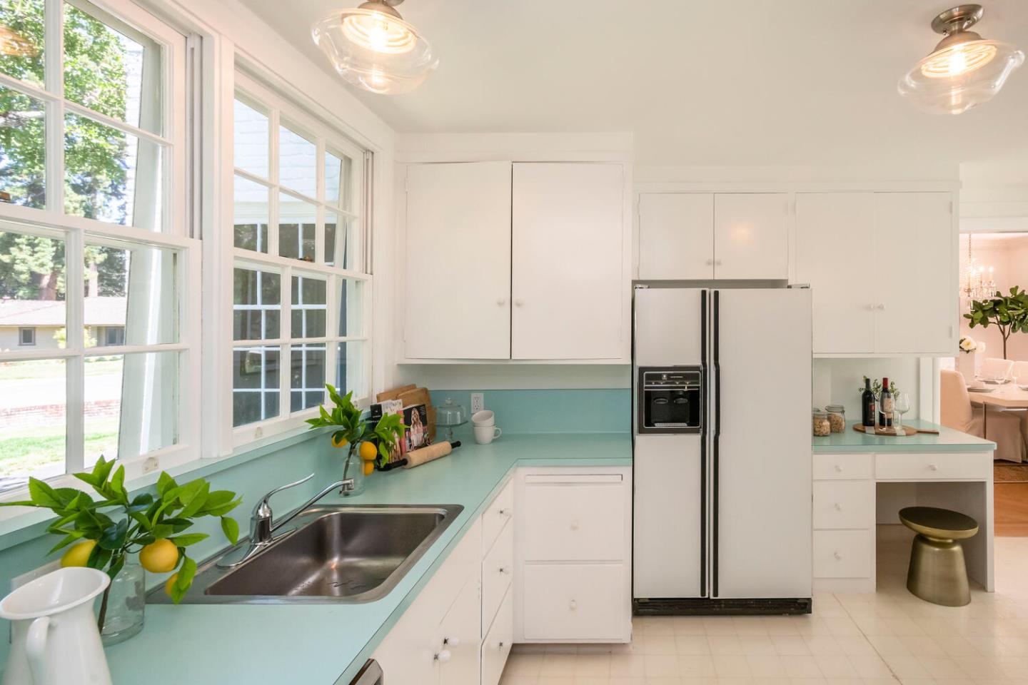 7 Windsor Drive Hillsborough, CA 94010 - Photo 18 of 57 a kitchen with furniture and a potted plant