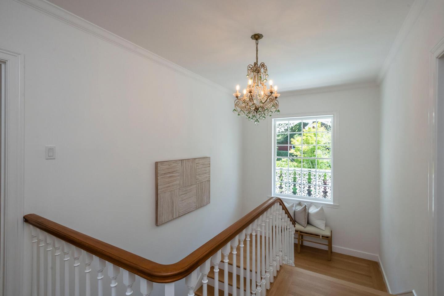 7 Windsor Drive Hillsborough, CA 94010 - Photo 23 of 57 a view of a hallway to a room with windows