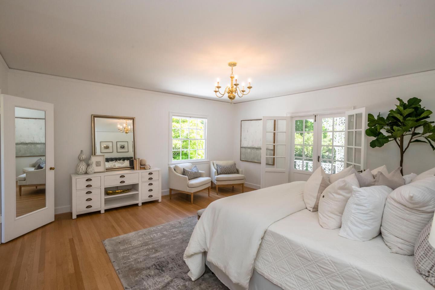 7 Windsor Drive Hillsborough, CA 94010 - Photo 28 of 57 a bedroom with bed and wooden floor