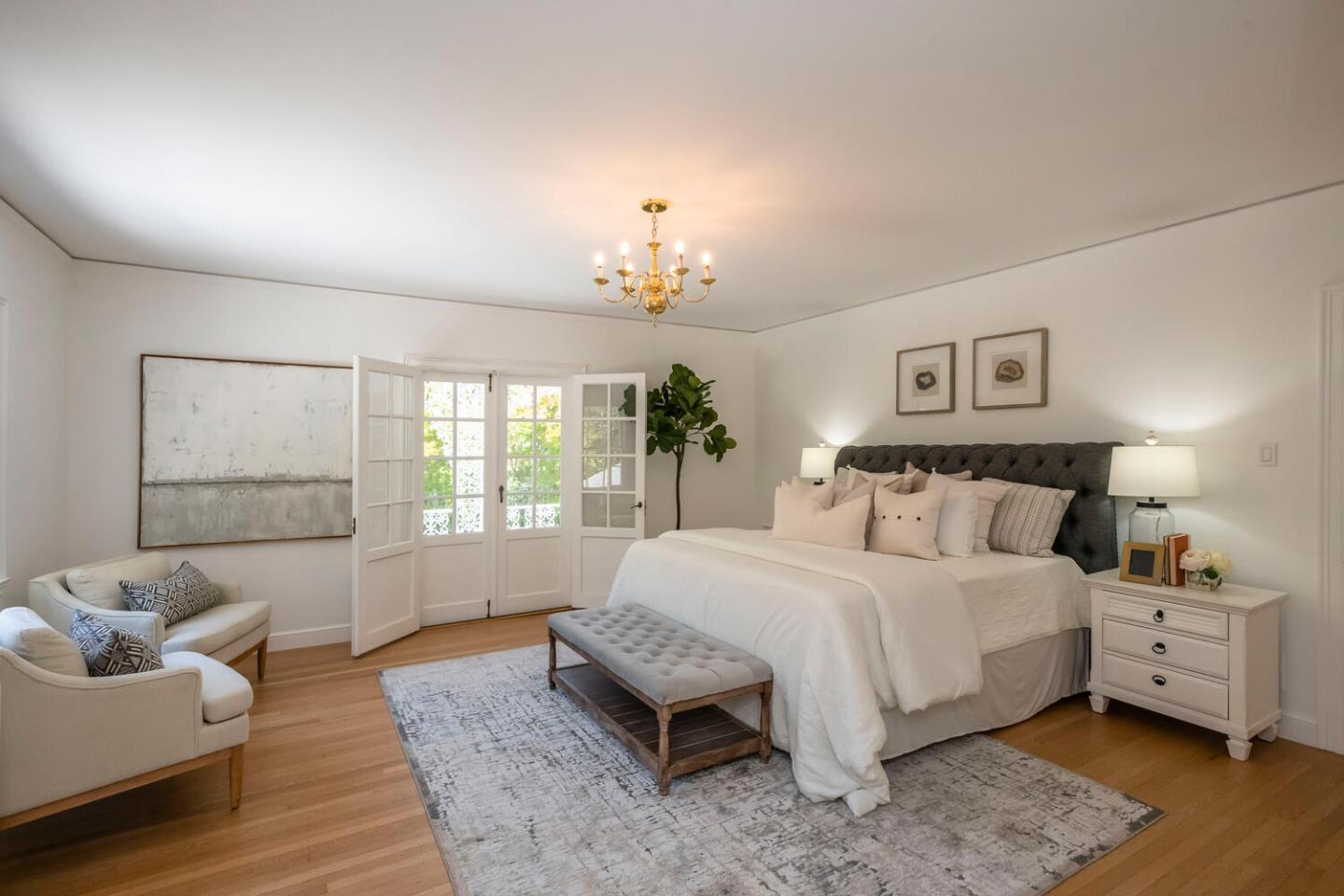 7 Windsor Drive Hillsborough, CA 94010 - Photo 29 of 57 a spacious bedroom with a bed and a couch