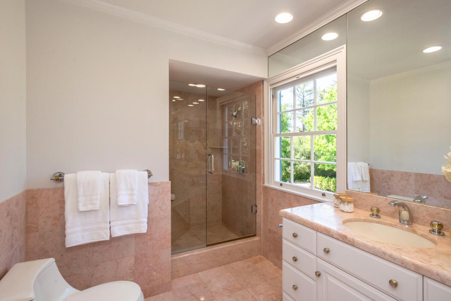 7 Windsor Drive Hillsborough, CA 94010 - Photo 31 of 57 a bathroom with a sink and a mirror