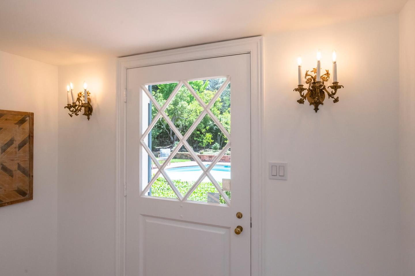 7 Windsor Drive Hillsborough, CA 94010 - Photo 36 of 57 a view of bathroom with a window and a chandelier fan